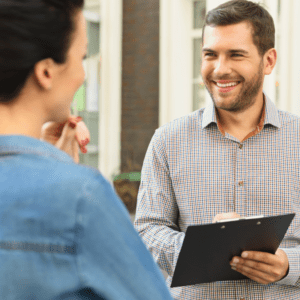 Man Smiling in front of a woman